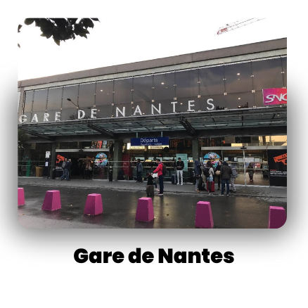 Gare de Nantes entrance with people, pink barriers, and SNCF logo visible.