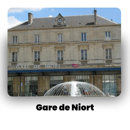 Gare de Niort train station in France with classic architecture and a central clock.