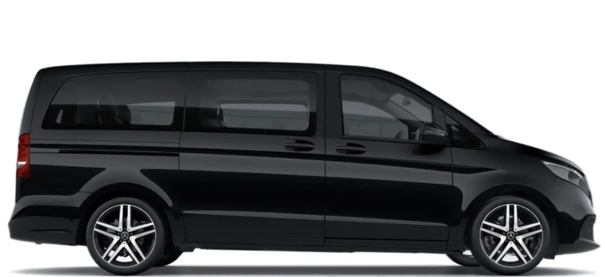 Black modern passenger van with tinted windows and alloy wheels, side view.